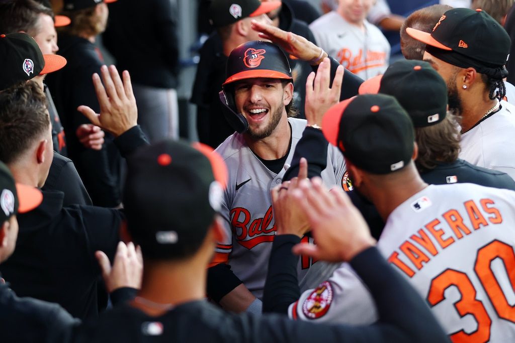 Blue Jays' Offensive Surge Secures Crucial Victory Over Division Rival Orioles