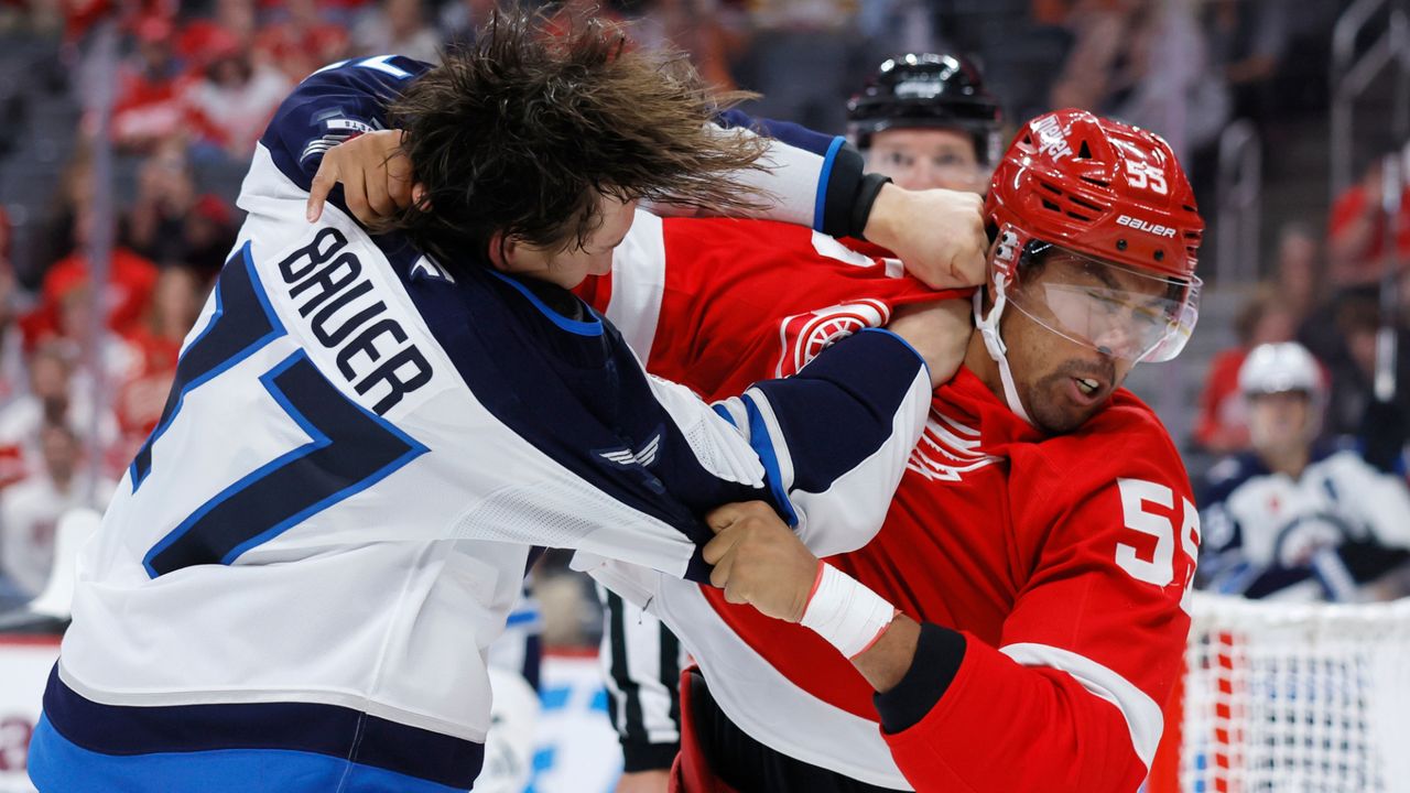 Connor scores twice as Jets beat Red Wings for first win