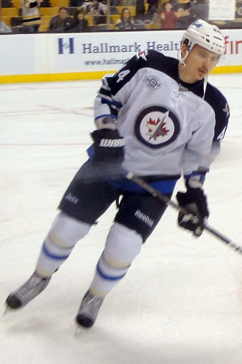 Jets fall to Bruins in overtime in season opener despite Connor's record goal