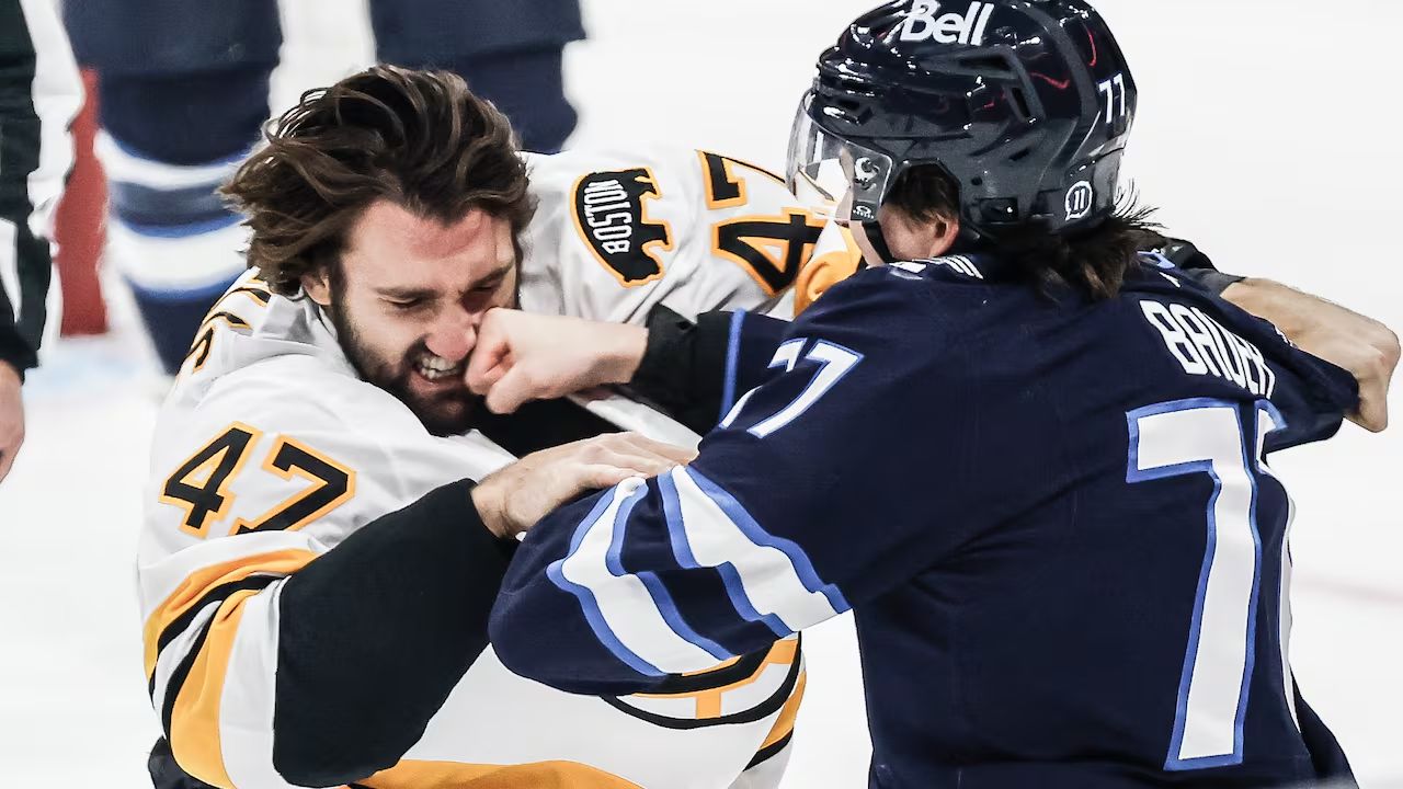 Jets fall to Bruins in overtime in season opener despite Connor's record goal