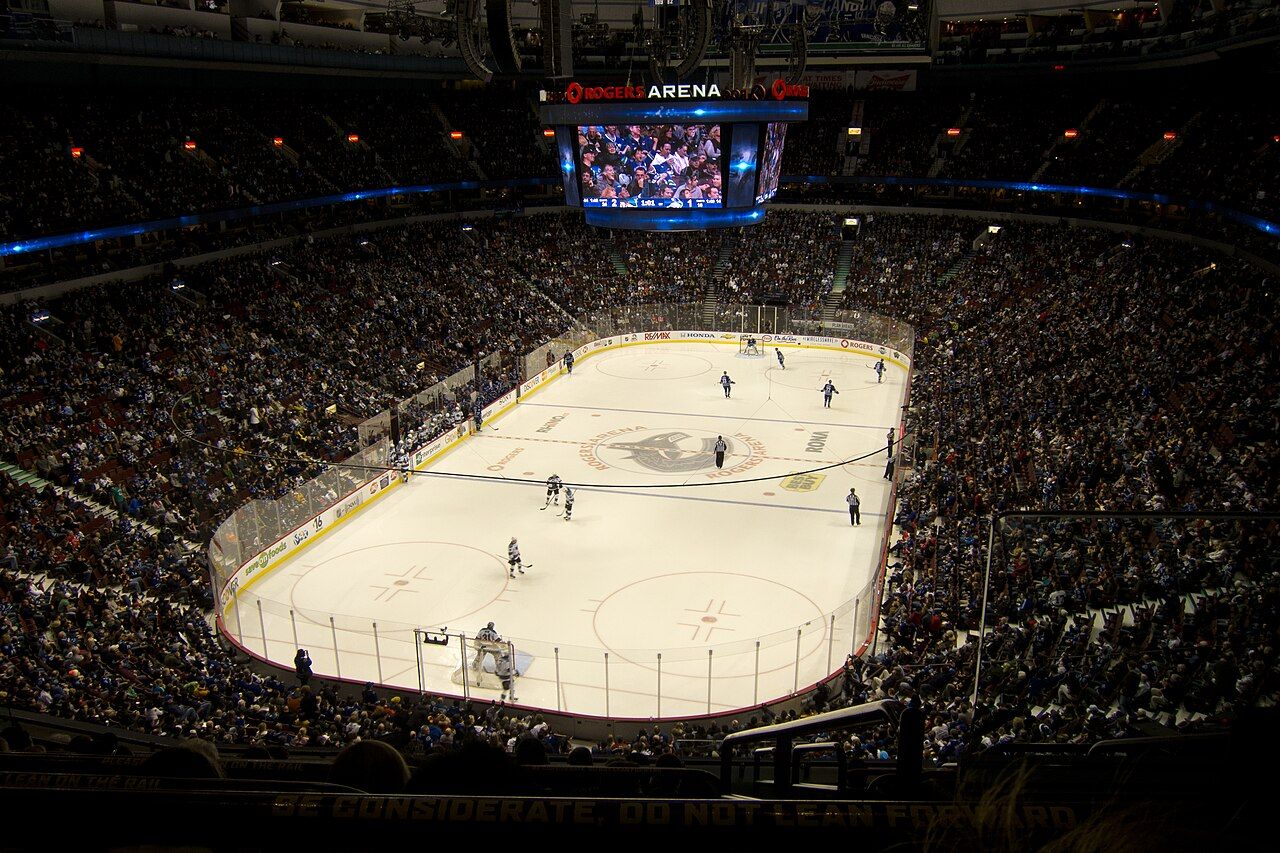 Sharks rally with three third-period goals to sink Canucks