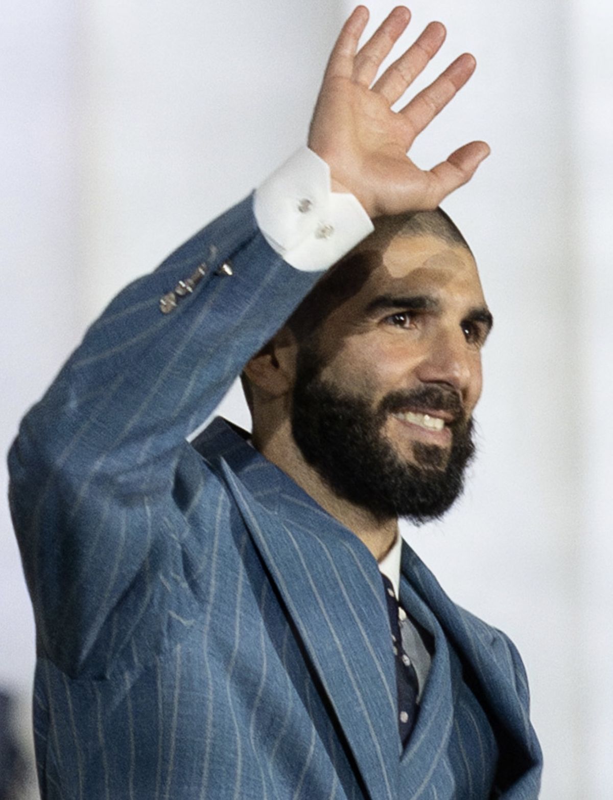 UFC fighter Aiemann Zahabi descends the steps of the Lincoln Memorial as The Armed Forces Full Honor Cordon stands in formation during the U