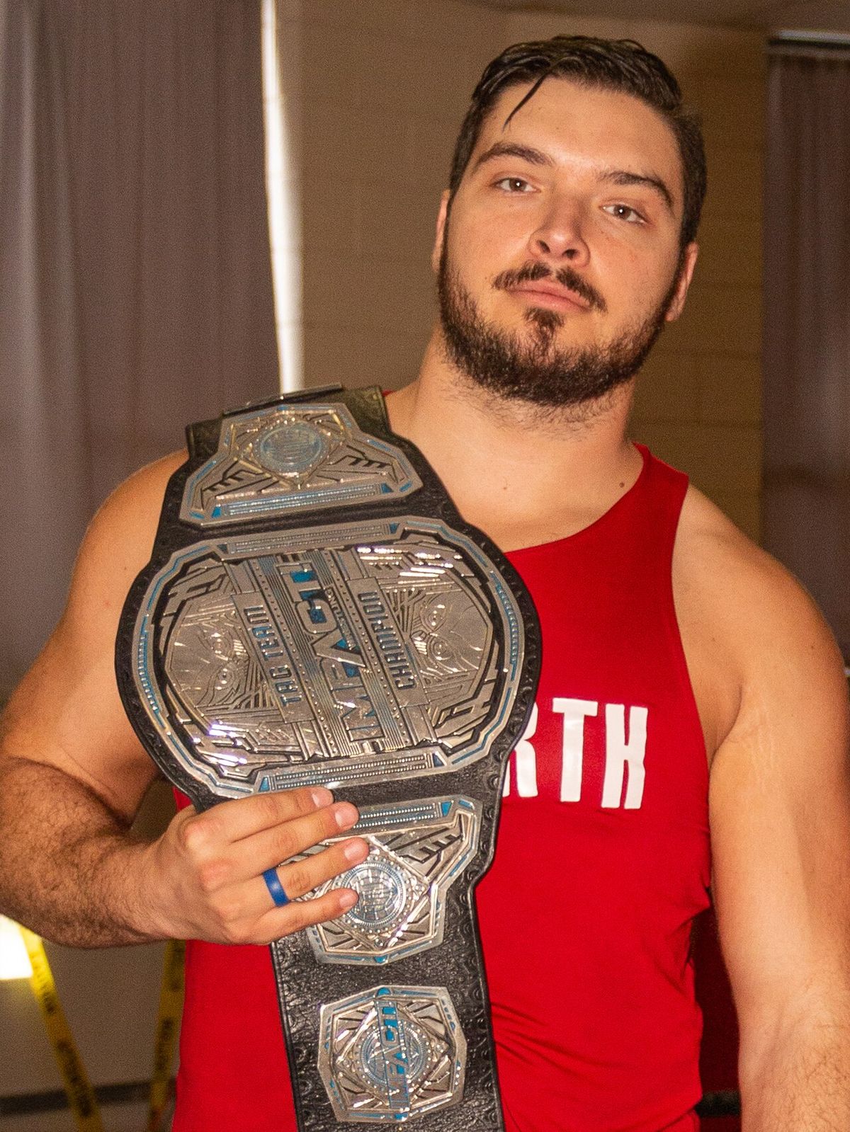 Impact World Tag Team champions The North - Ethan Page (left) and Josh Alexander - posing with the championship belts pre-show at an Alpha-1