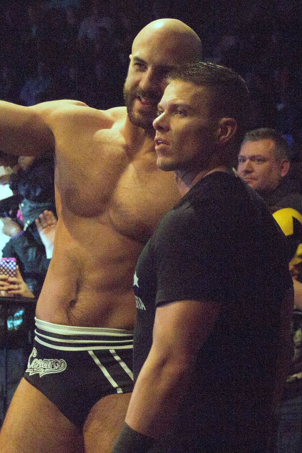 Tyson Kidd and Cesaro at a WWE event in the Garrett Coliseum on January 10, 2015. Cropped from original and colour corrected.