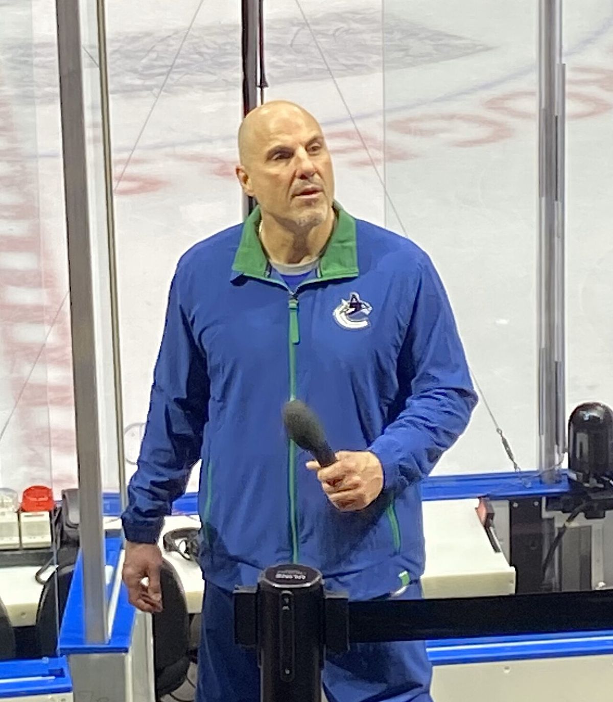 Vancouver Canucks head coach Rick Tocchet answers questions from fans during a team practice, February 16, 2024, at Rogers Arena in Vancouve