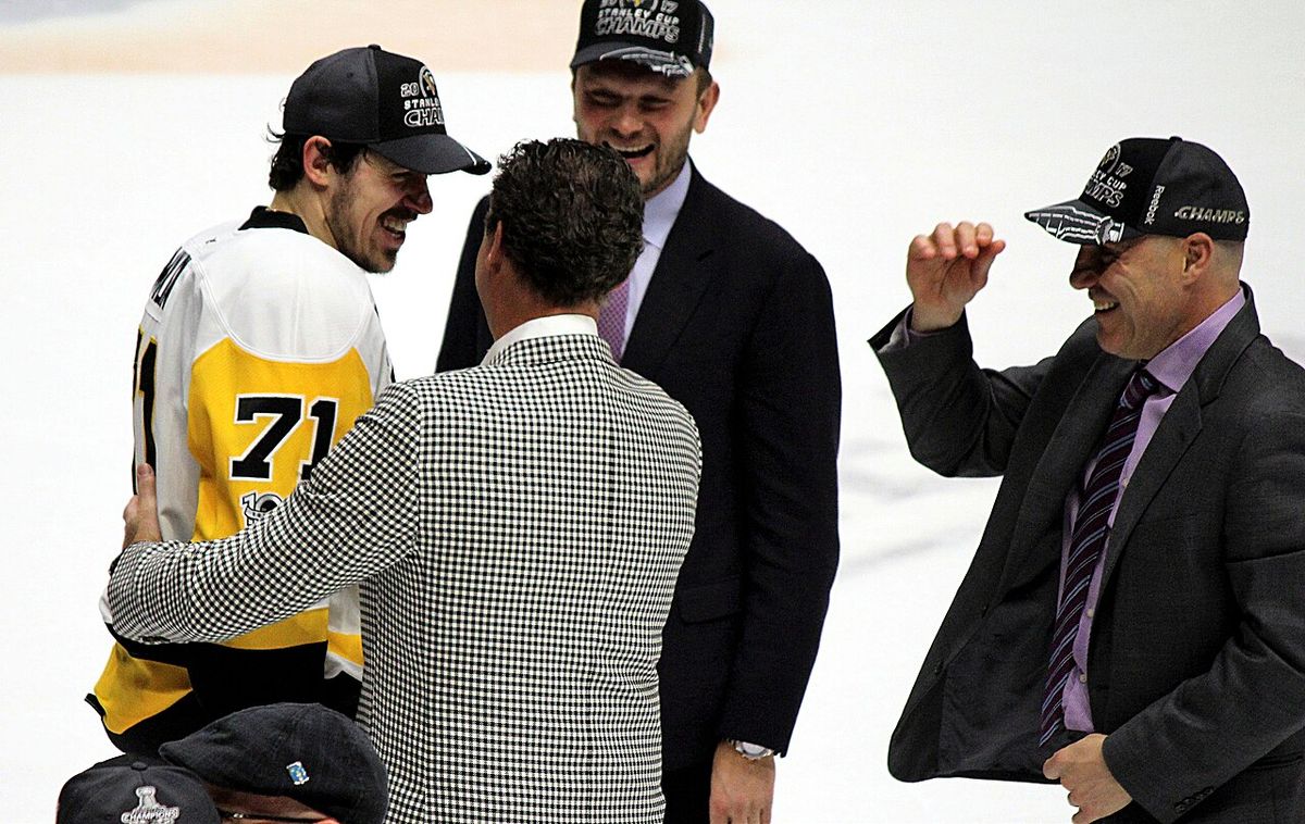 Evgeni Malkin talks to Mario Lemieux, Sergei Gonchar and Rick Tocchet following the Pittsburgh Penguins Stanley Cup win in Nashville in 2017