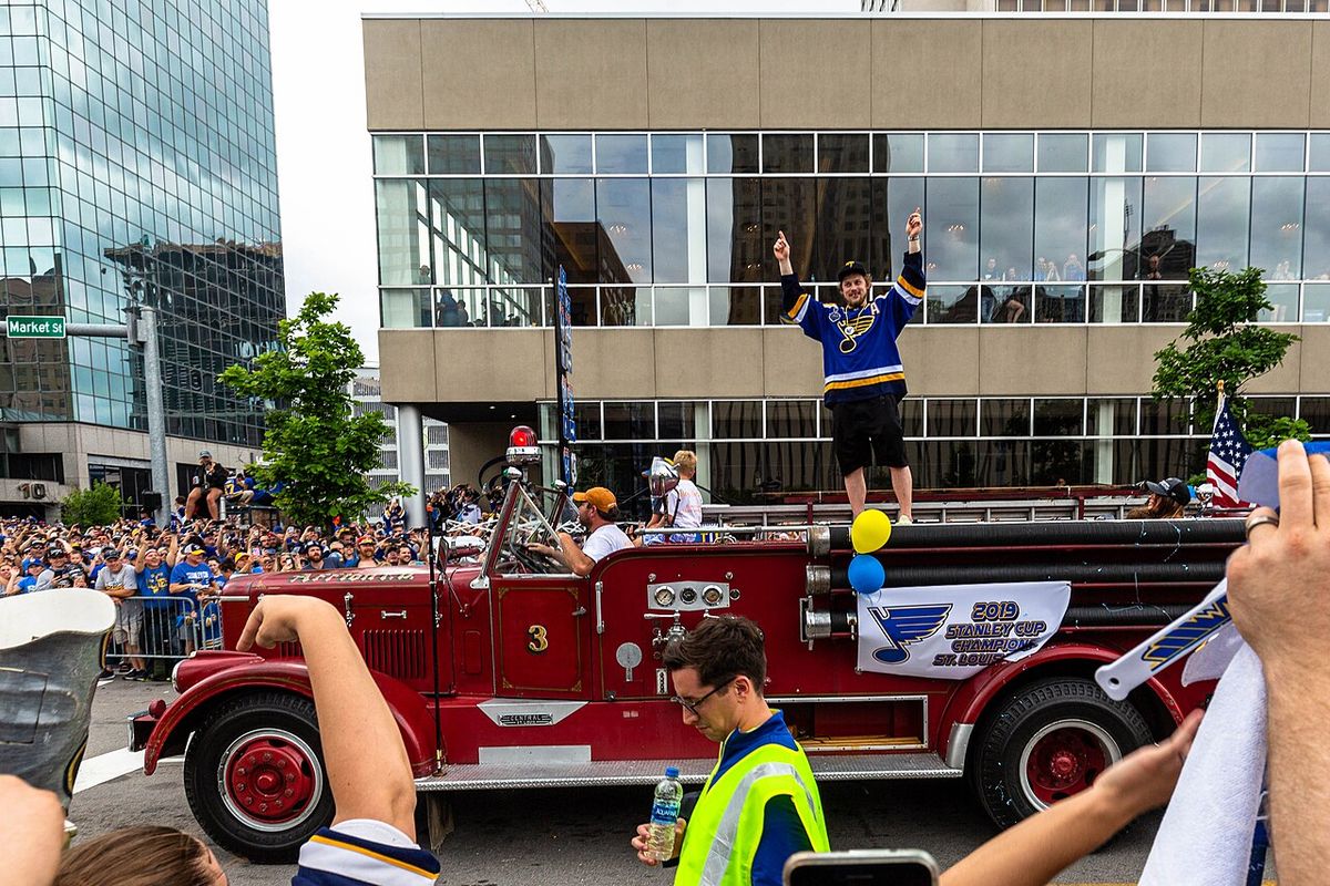 Vladimir Tarasenko salutes the crowd at the corner of Broadway and Market Street.