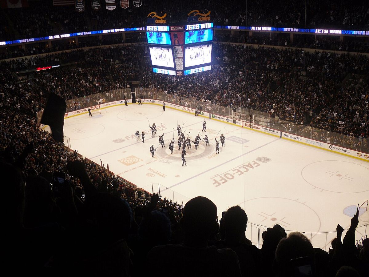 This picture was taken as the Winnipeg Jets of the National Hockey League celebrate their first regulation win as re-born team at the MTS Ce